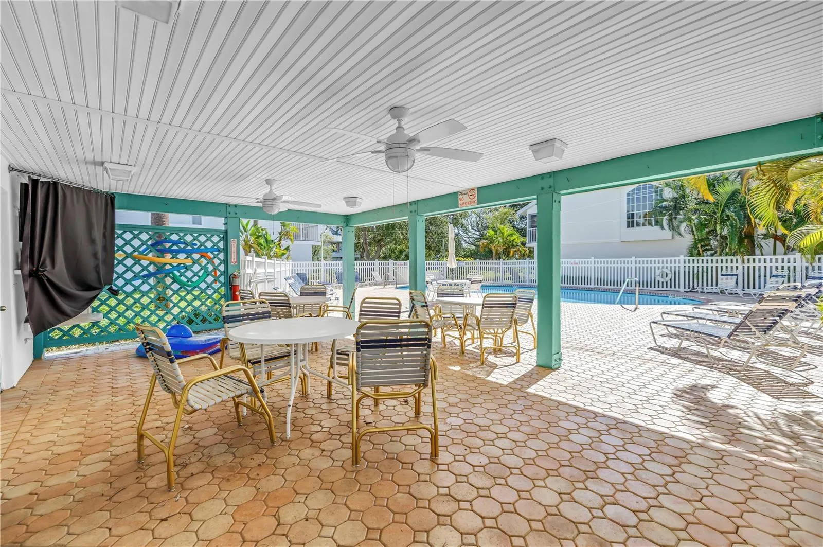 Community pool with covered seating area