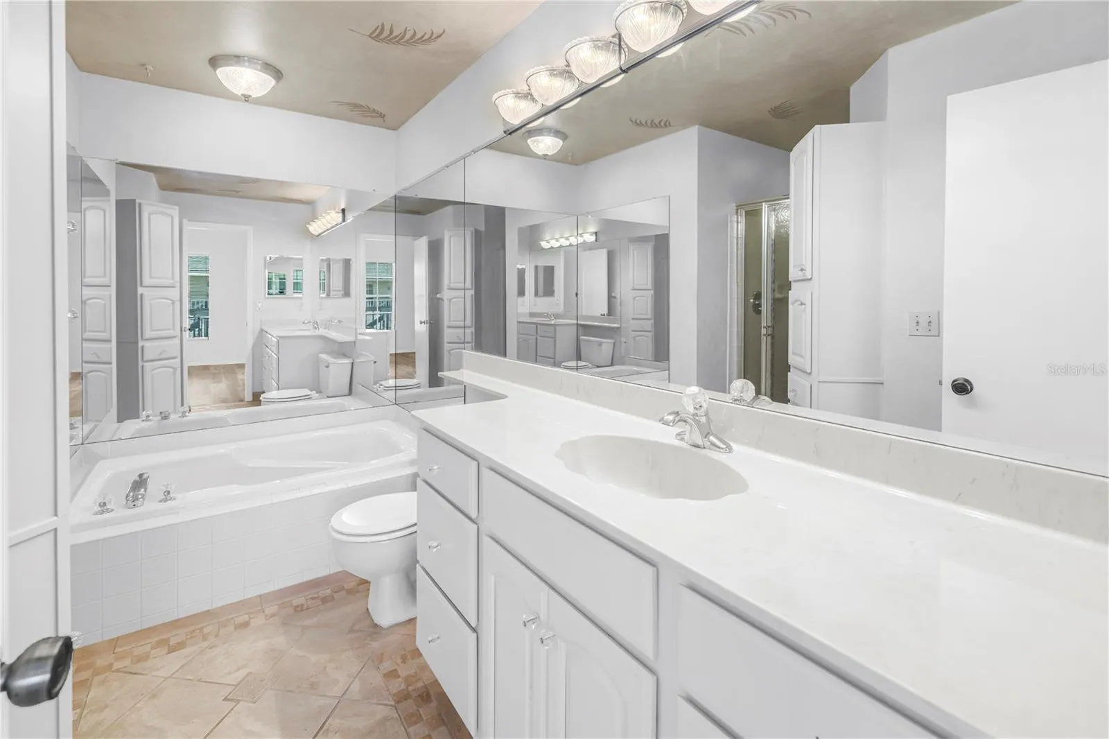 Primary bathroom with soaking tub and shower