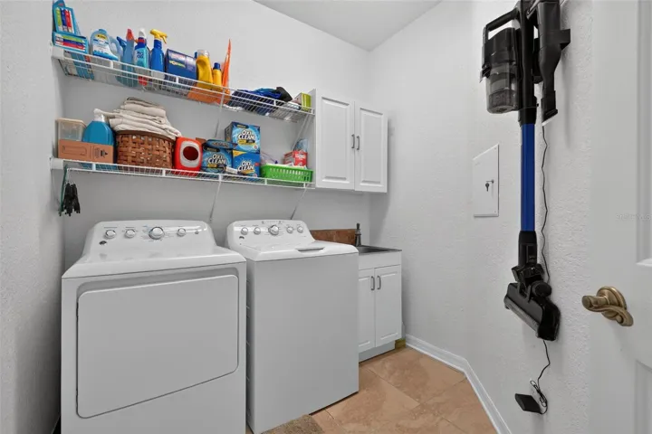 Laundry room with sink