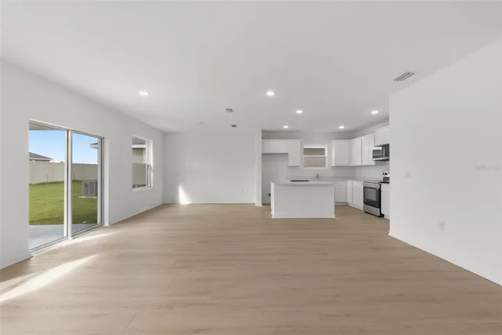 Open concept living, dining, and kitchen