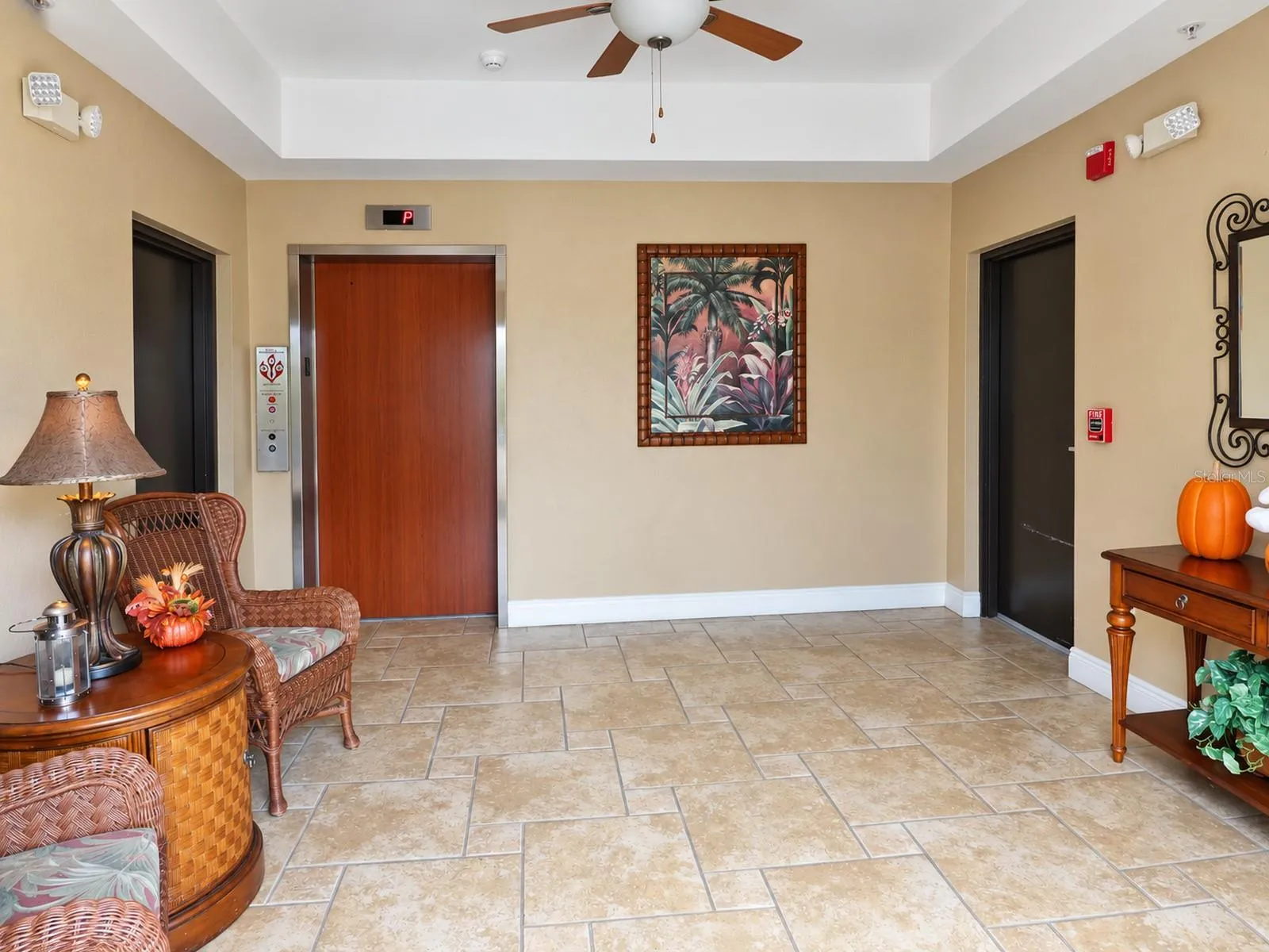 Welcoming ground level foyer.  Garage and elevator access