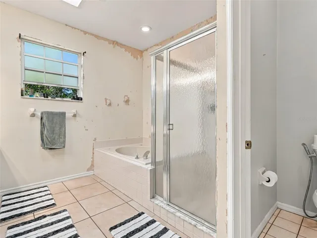 Large soaking tub and separate shower