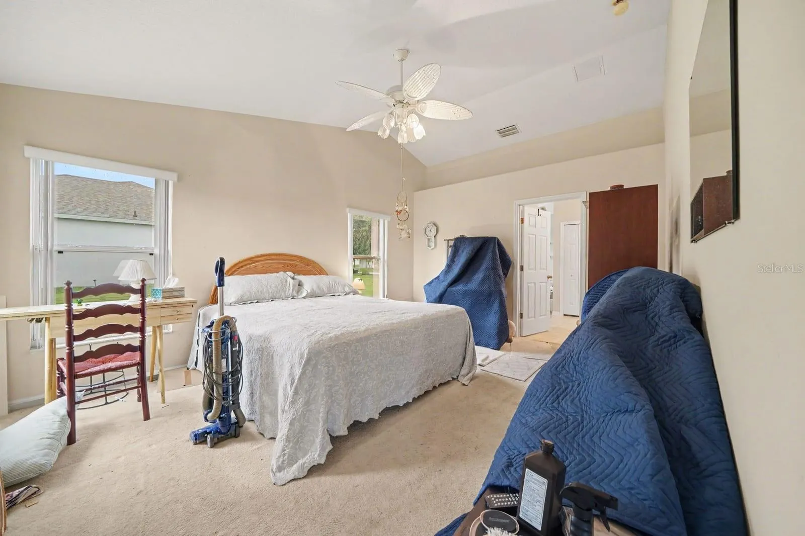 Master Bedroom Suite with Multiple Beds & Sliding Glass Doors