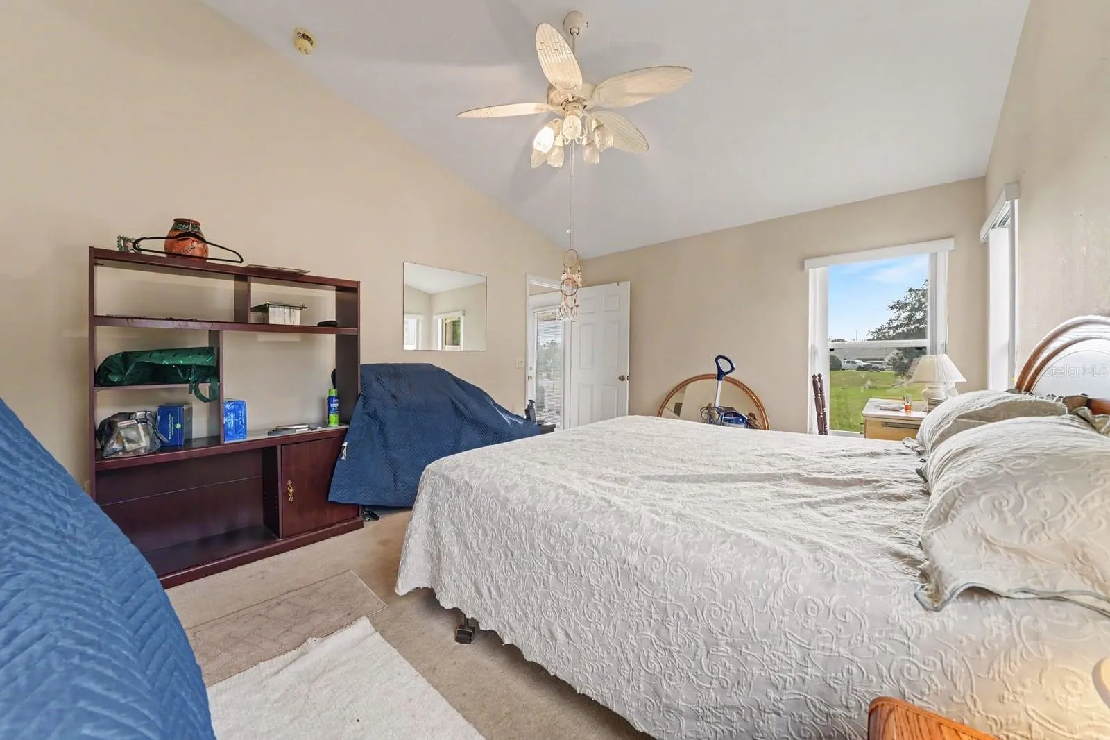 Master Bedroom with Vaulted Ceiling & Abundant Natural Light