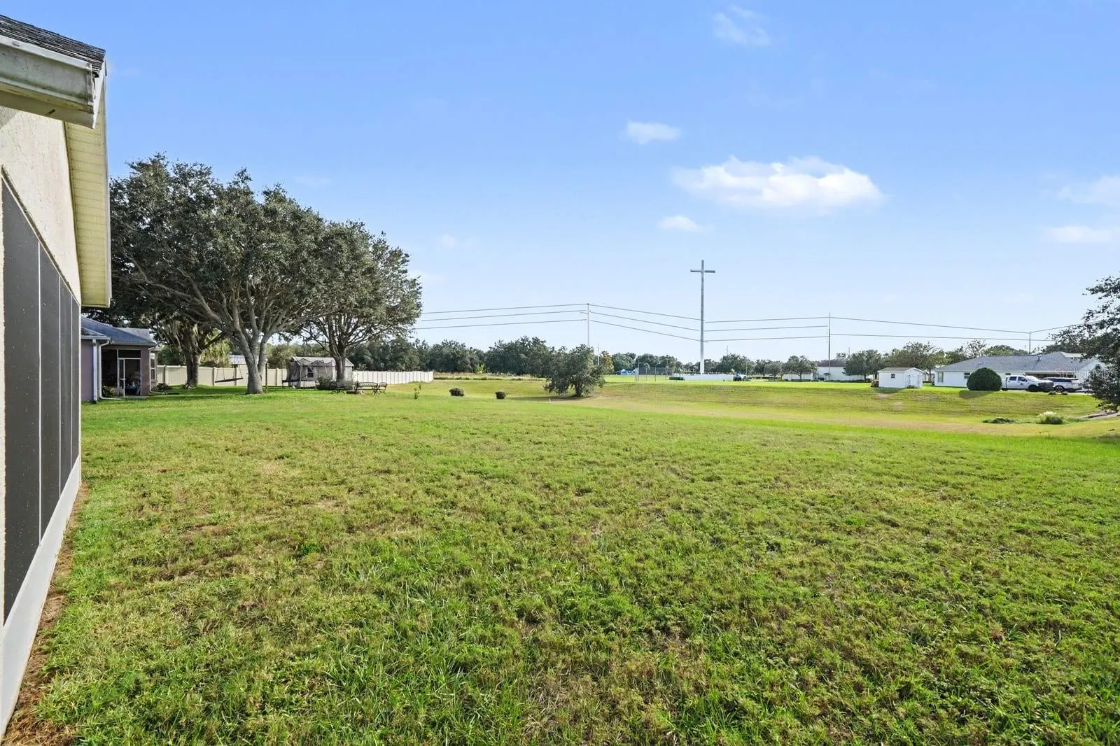 Expansive Rear Yard with Mature Trees and Open Space