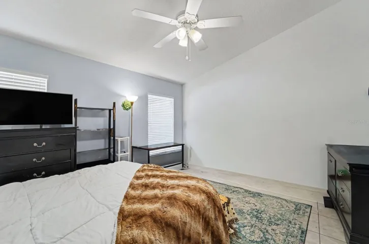 Master Bedroom Suite with Ensuite Access, Generous Closet Space, and Bright Natural Light