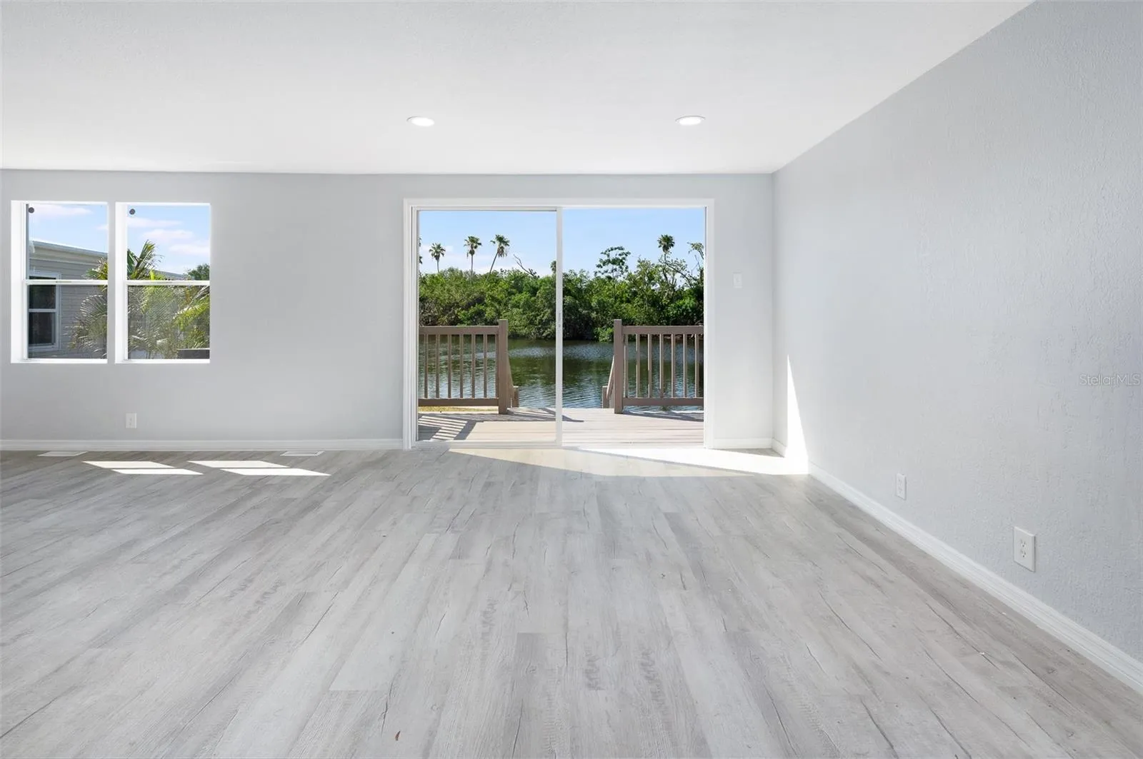 Livingroom facing waterfront canal to Tampa Bay