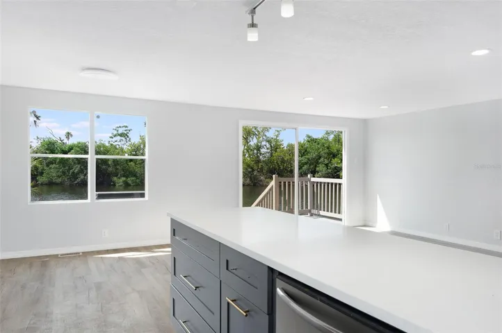 kitchen facing waterfront  via diningroom and livingroom