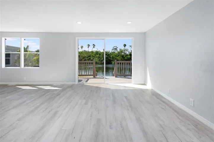 Livingroom facing waterfront canal to Tampa Bay