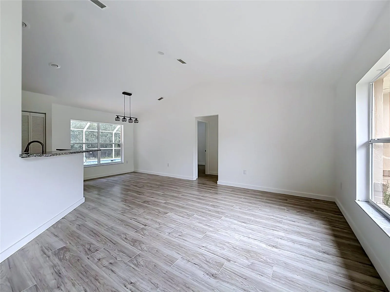 Vaulted ceilings give the living area an airy feel.
