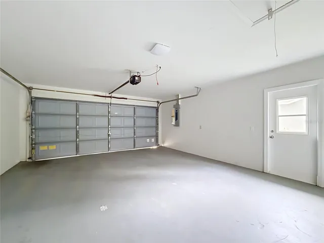 Two-car garage with room for parking and storage.