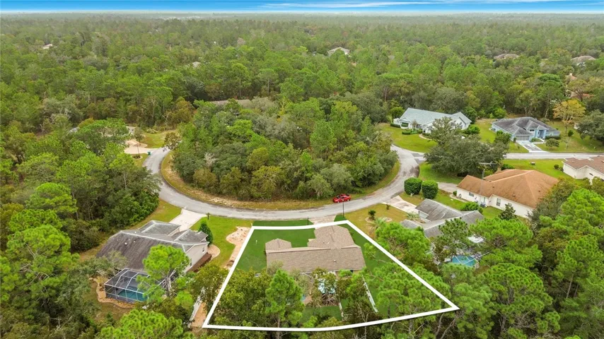 A wooded setting. Lot lines shown are approximate.