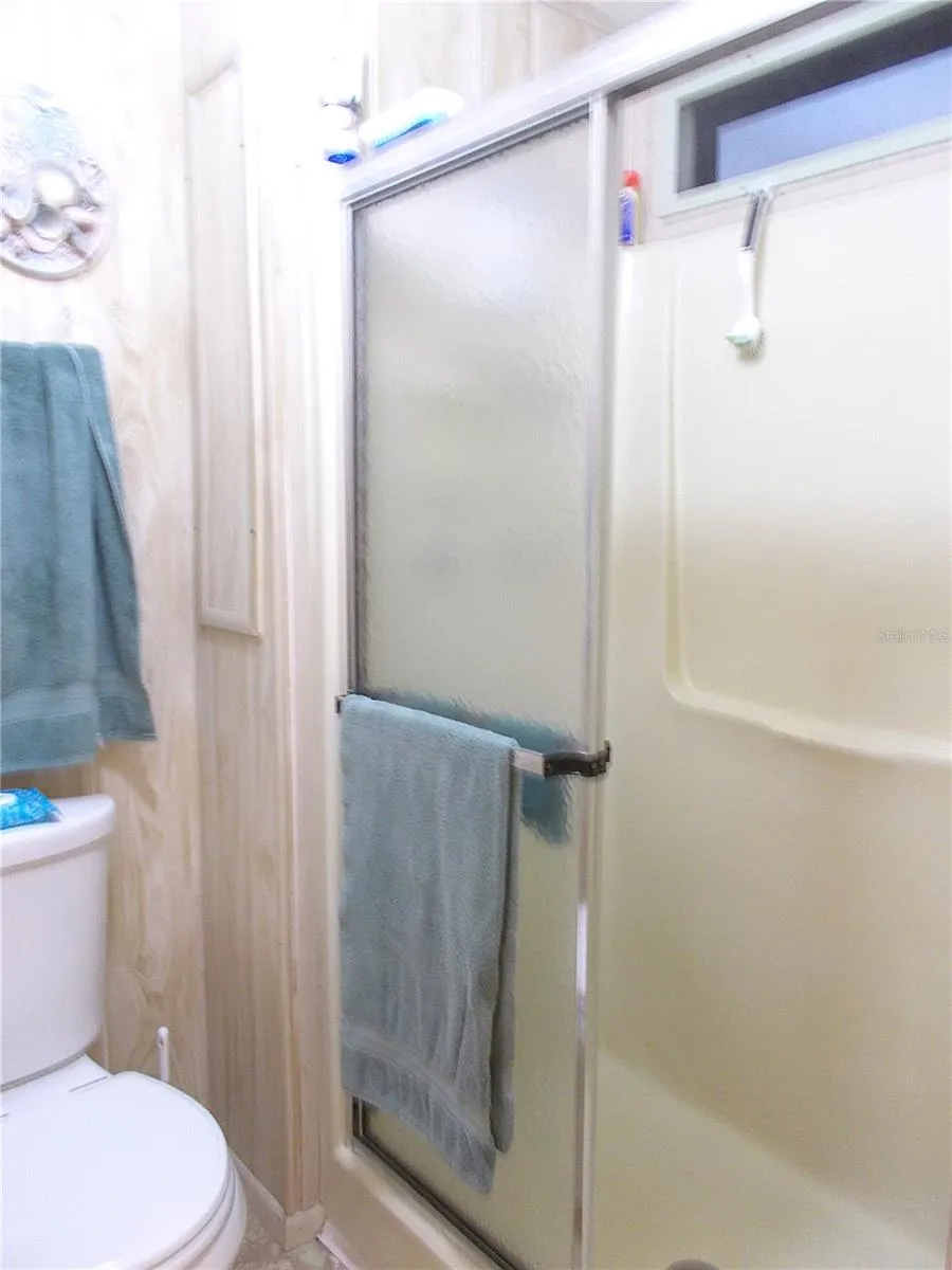 Ensuite bathroom walk-in shower & comode