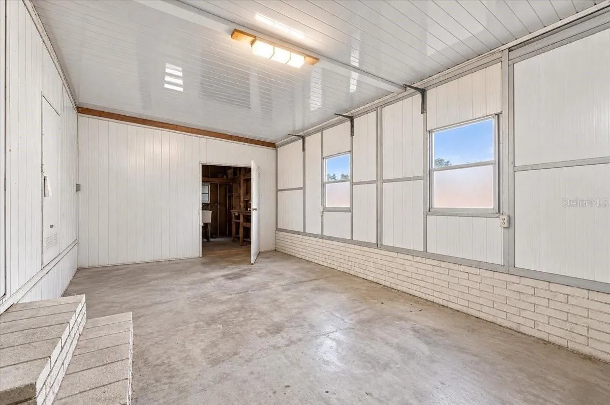 Workshop area w/ window unit AC