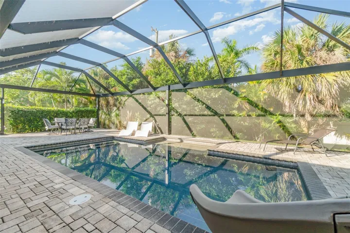 Pool area with plenty of deck area.