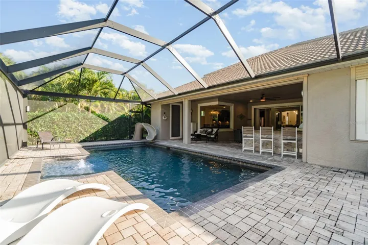 Pool area with plenty of deck area.