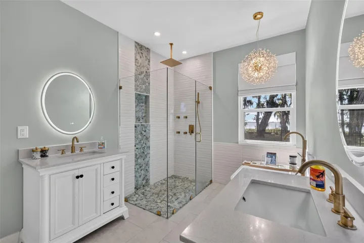 Primary en-suite bathroom. With dual vanities, soaking tub and frameless shower; and more incredible views!