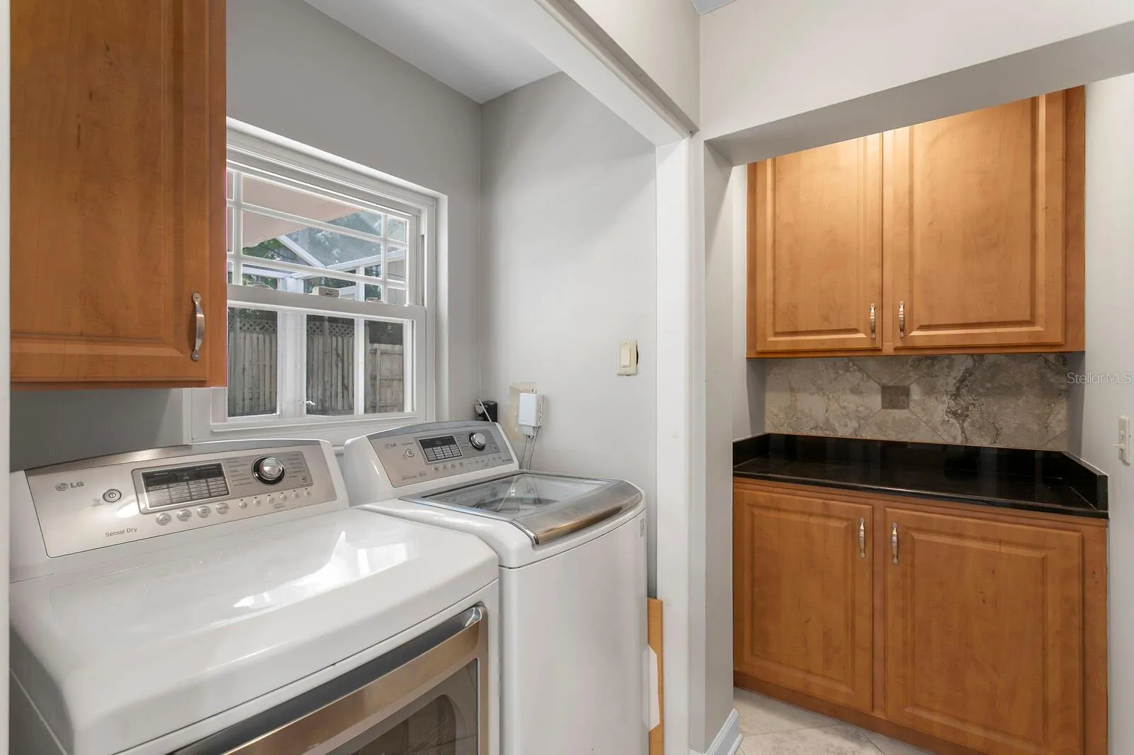 Laundry is next to the kitchen.