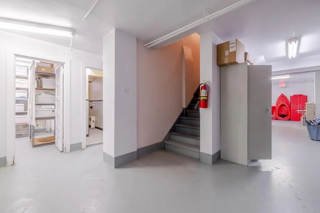 Basement with interior stairwell to first floor.