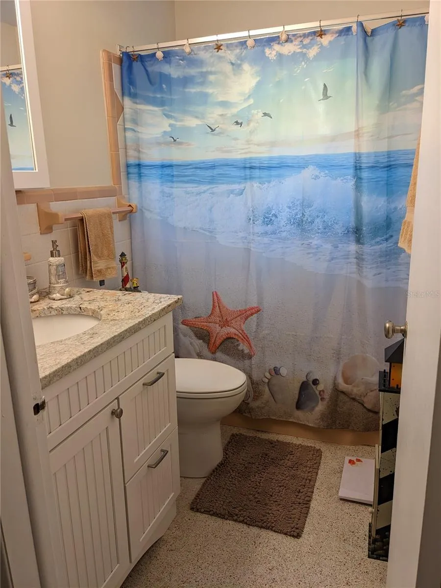 Guest bathroom with granite countertop