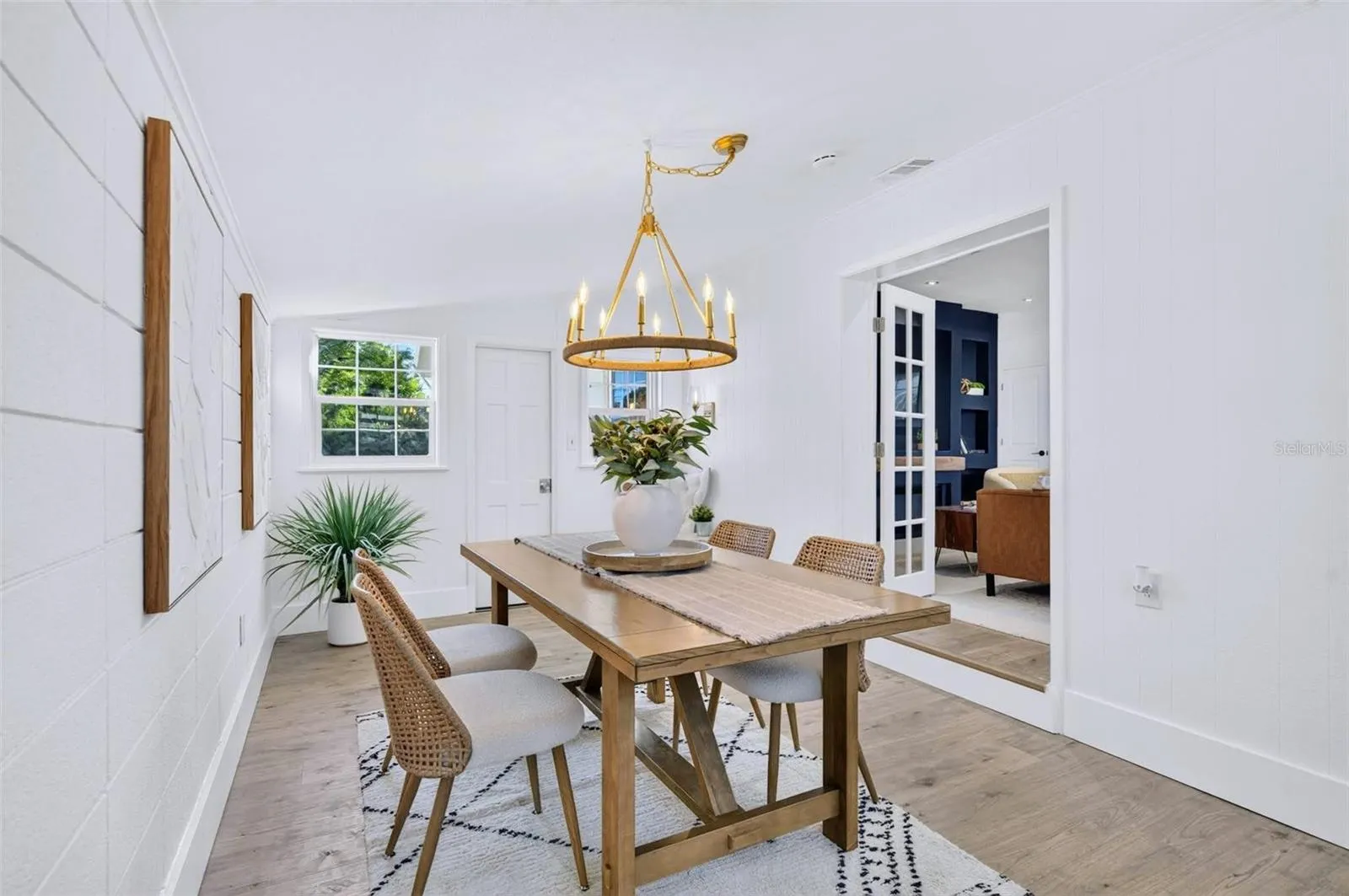 Gorgeous chandelier with links and a hook, to be moveable depending on the size of the owners dining table.