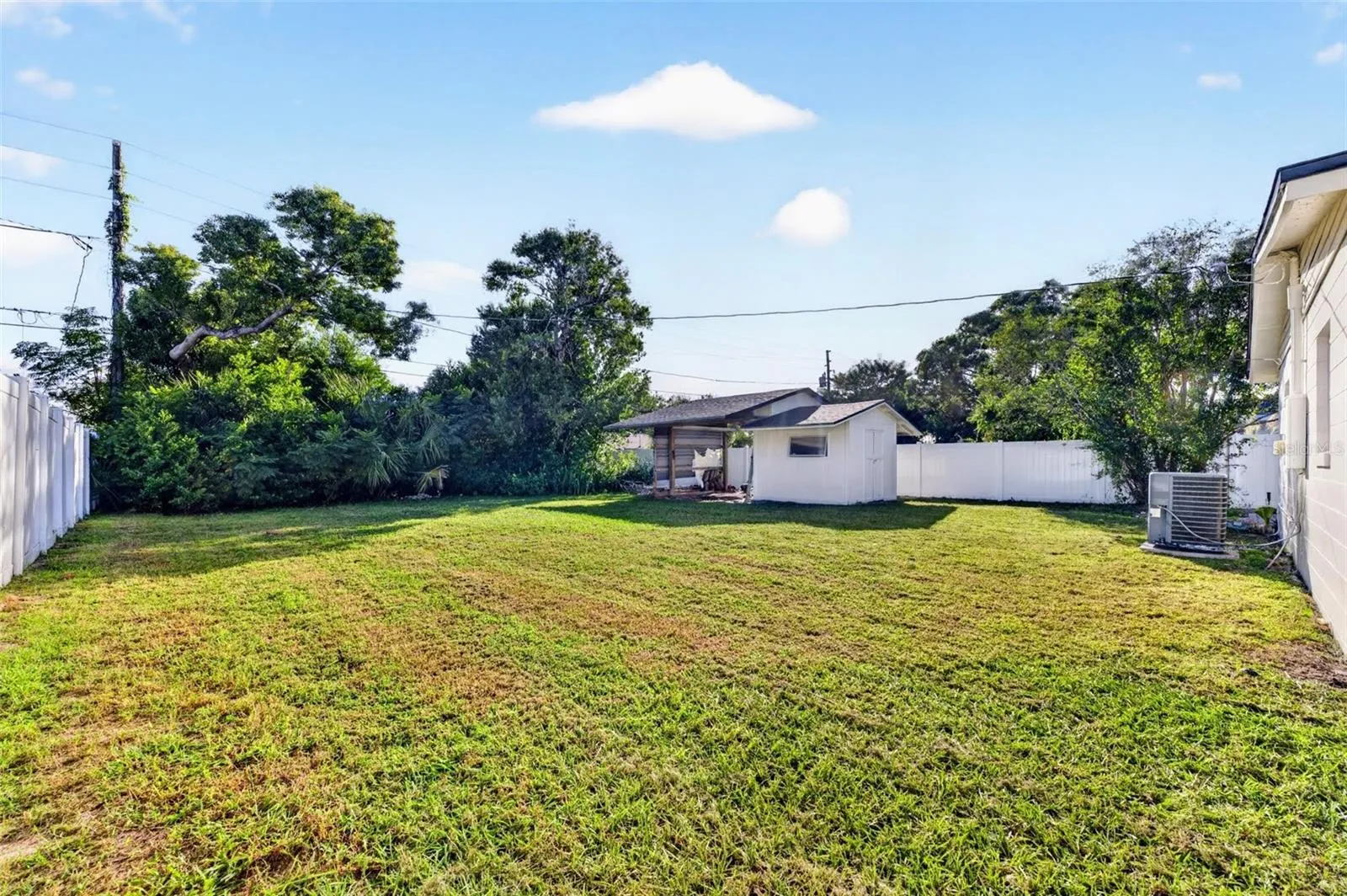 This backyard is huge and completely private with fencing all around it feels like having your own park back there,