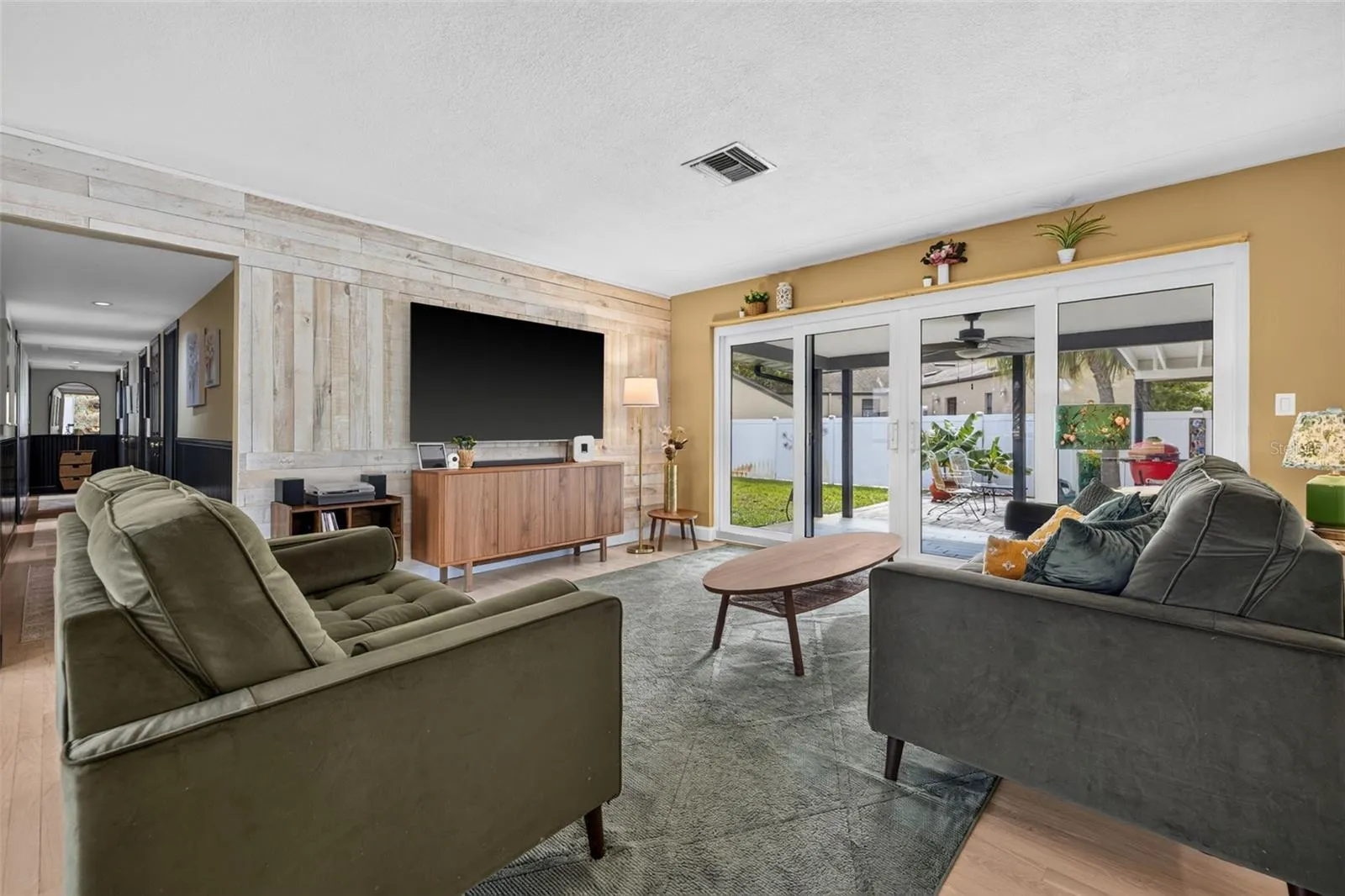 Living room with sliders to back porch