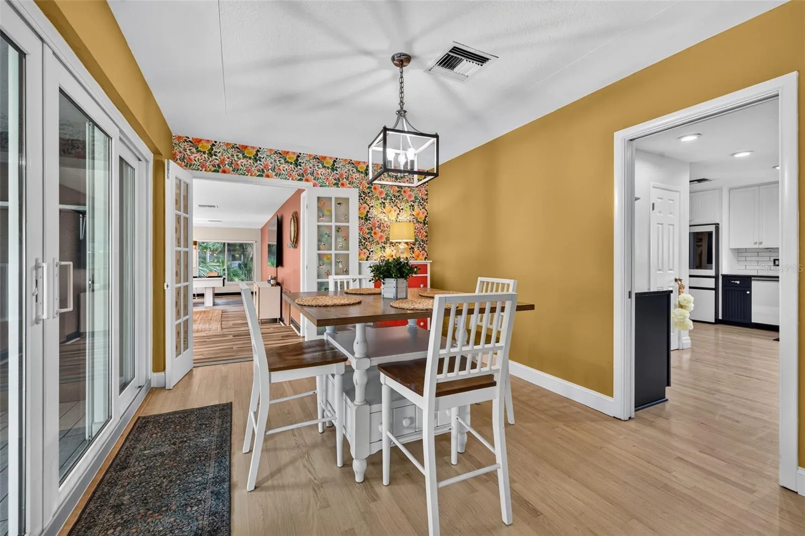 Dining area with sliders to back porch