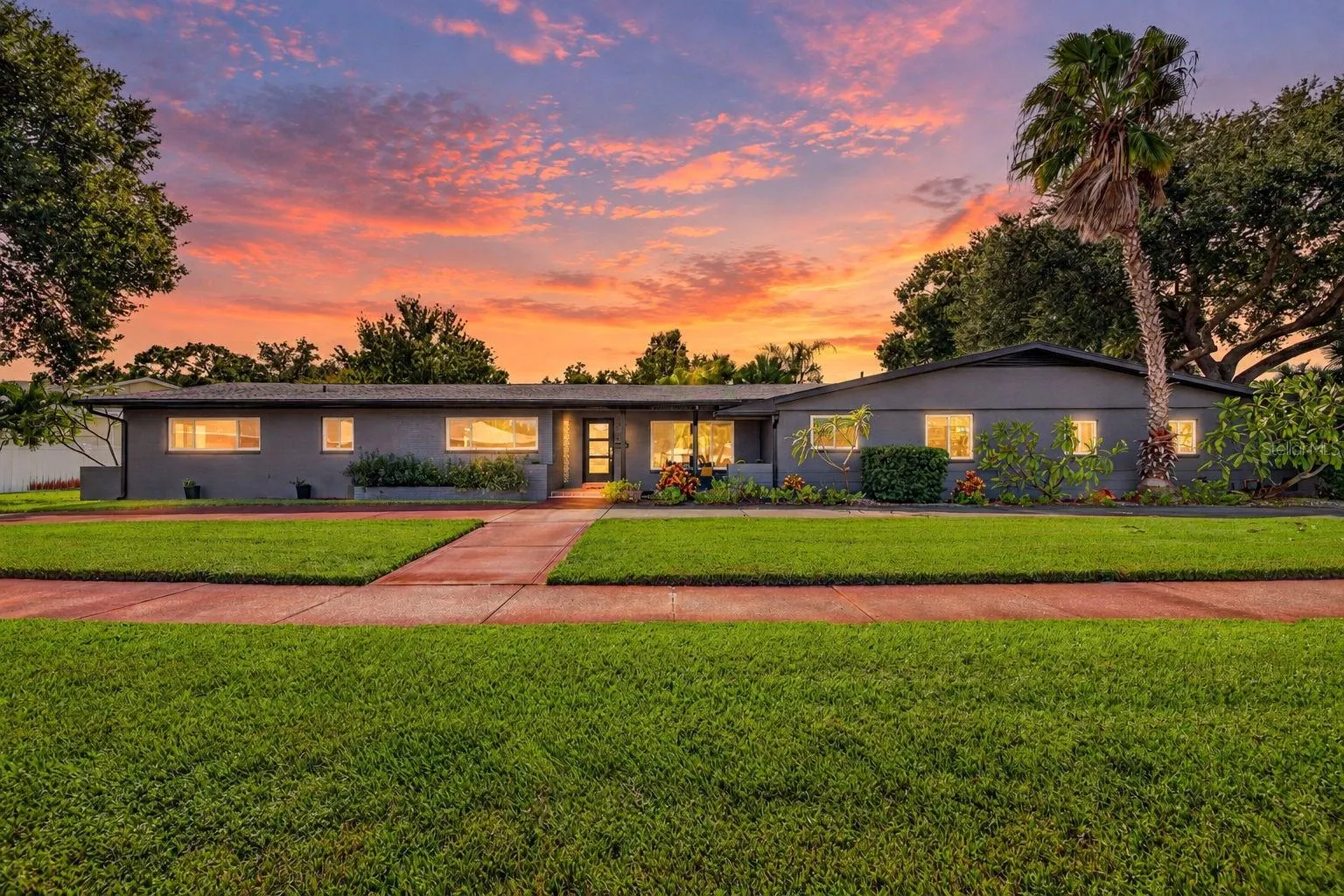 The iconic brick streets of Eagle Crest introduce this impressive ranch style home situated on a  curved 15,000 sqft double lot.