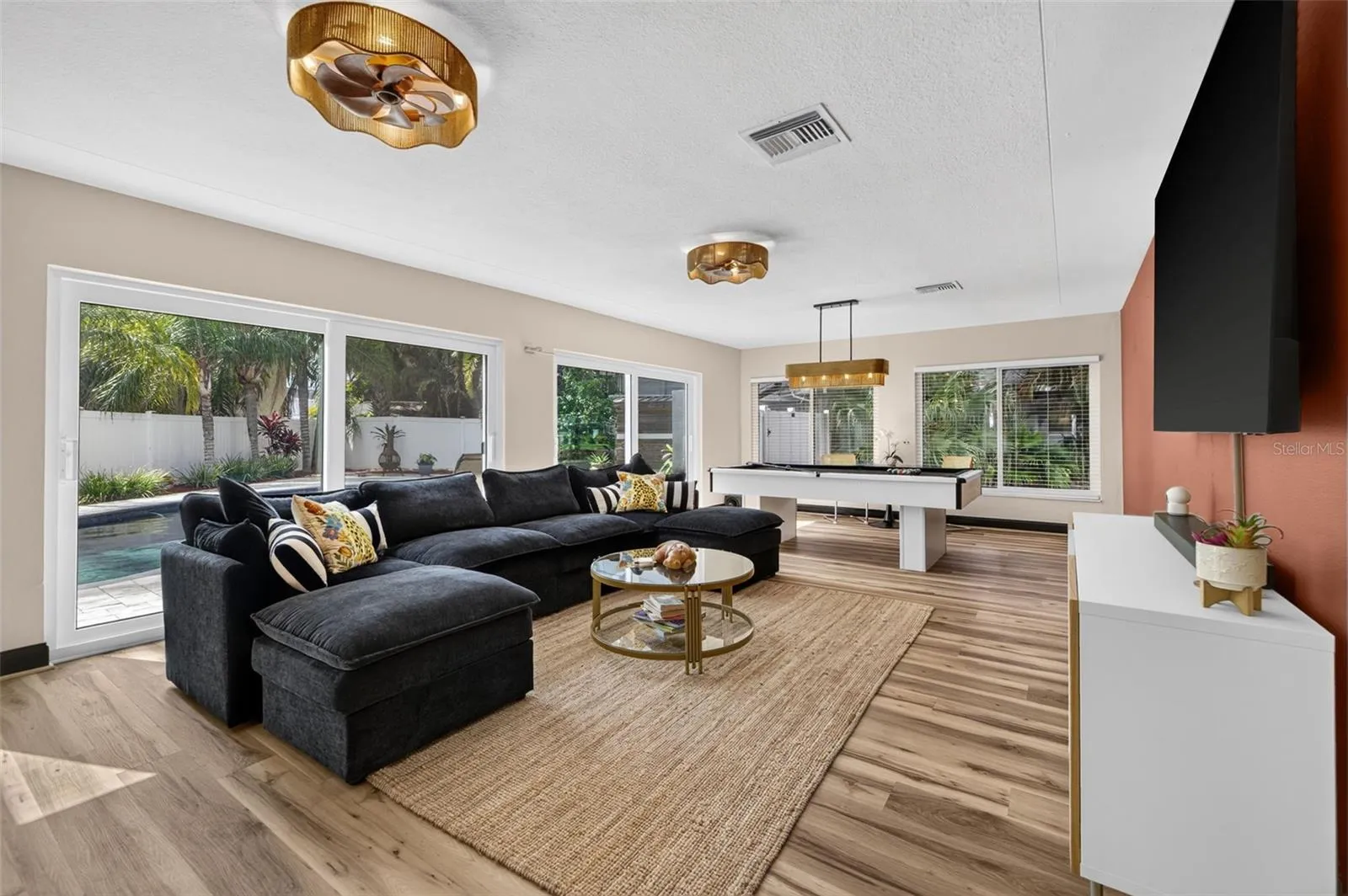 Family room with sliders to pool