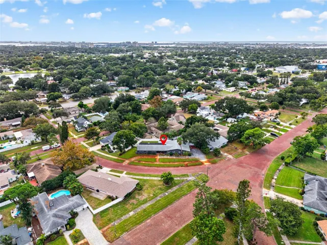 The iconic brick streets of Eagle Crest introduce this impressive ranch style home situated on a  curved 15,000 sqft double lot.