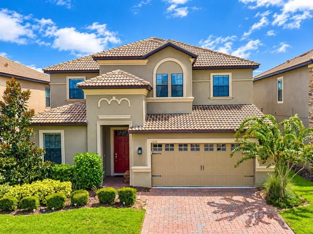 Welcome to 1520 Moon Valley Drive! This 7-Bedroom, 5-Bathroom Vacation Villa is Located in The Retreat at ChampionsGate