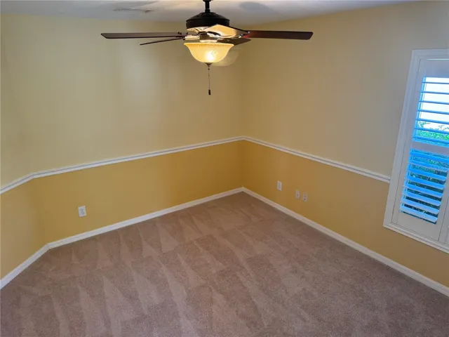 Another large bedroom on the first floor with it's own adjacent full bathroom
