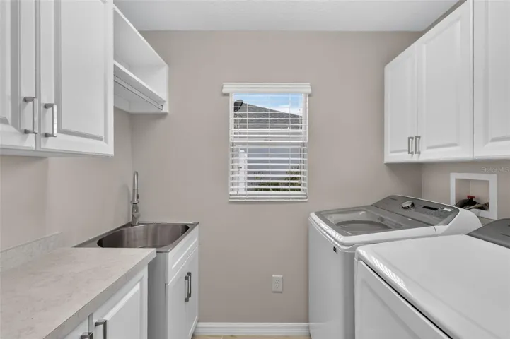 Laundry Room with Sink and Cabinets for extra Storage