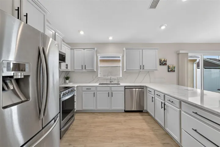 Chef Kitchen w/ an Expansive Breakfast Bar