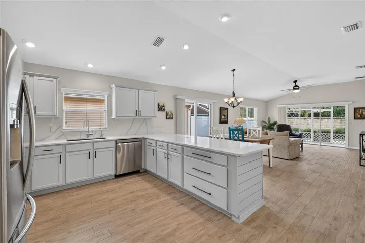 Open Concept - High Vaulted Ceiling - Porcelain Tile Throughout
