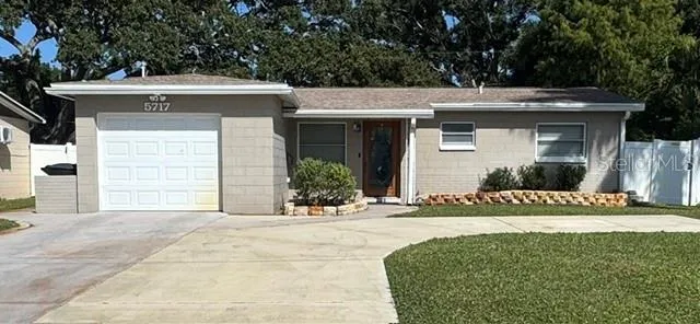 Front view of property with off street parking for five vehicles