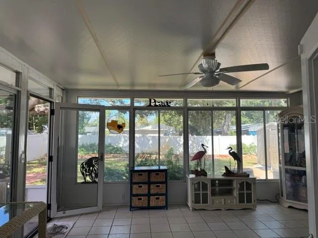 Sunroom view from entry at back of dining room