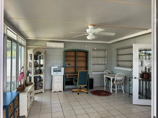 Sunroom view from entry at screened back porch
