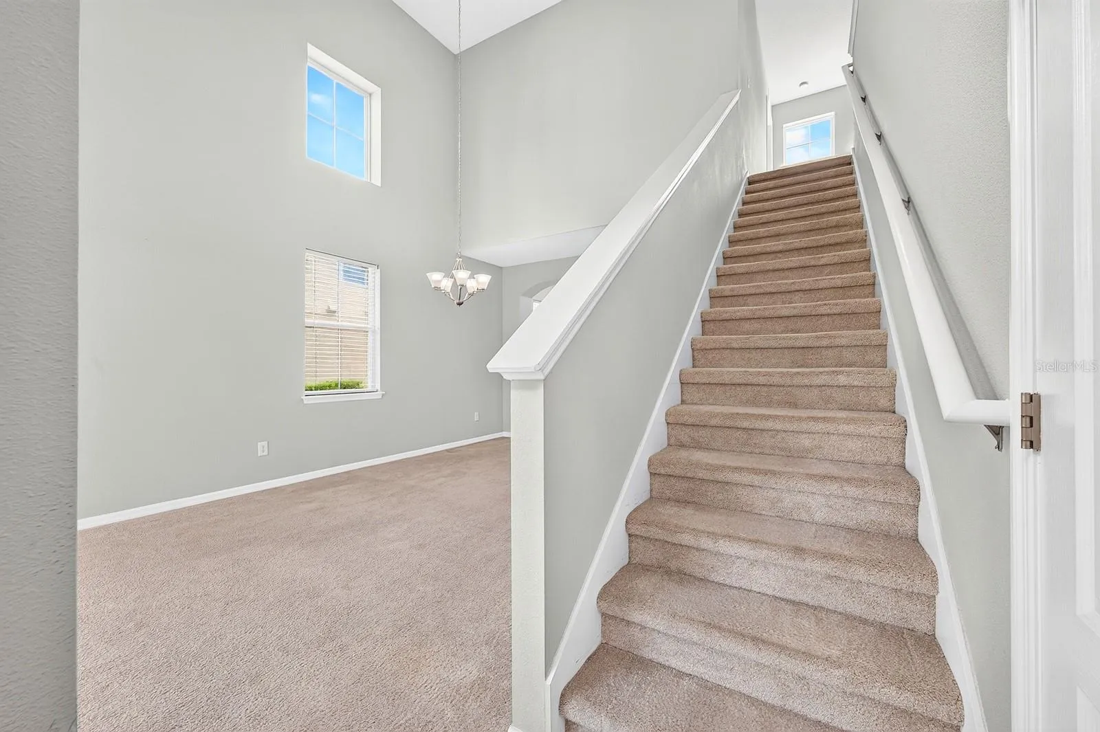 Head up the stairs to the Flexible Loft space and 2 more Bedrooms.