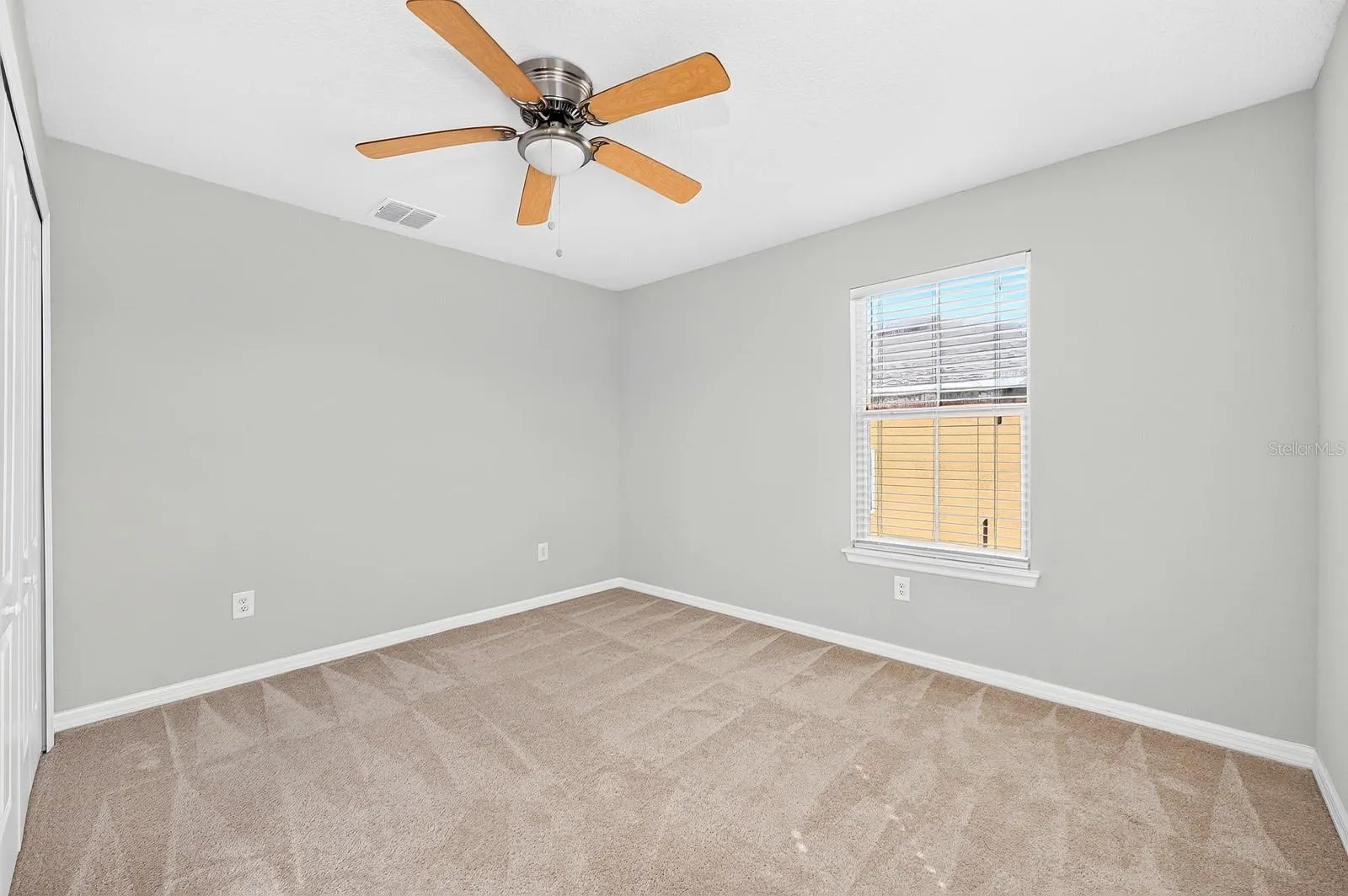 Bedroom 2 offers flexibility for use as a guest room, home office or hobby space.
