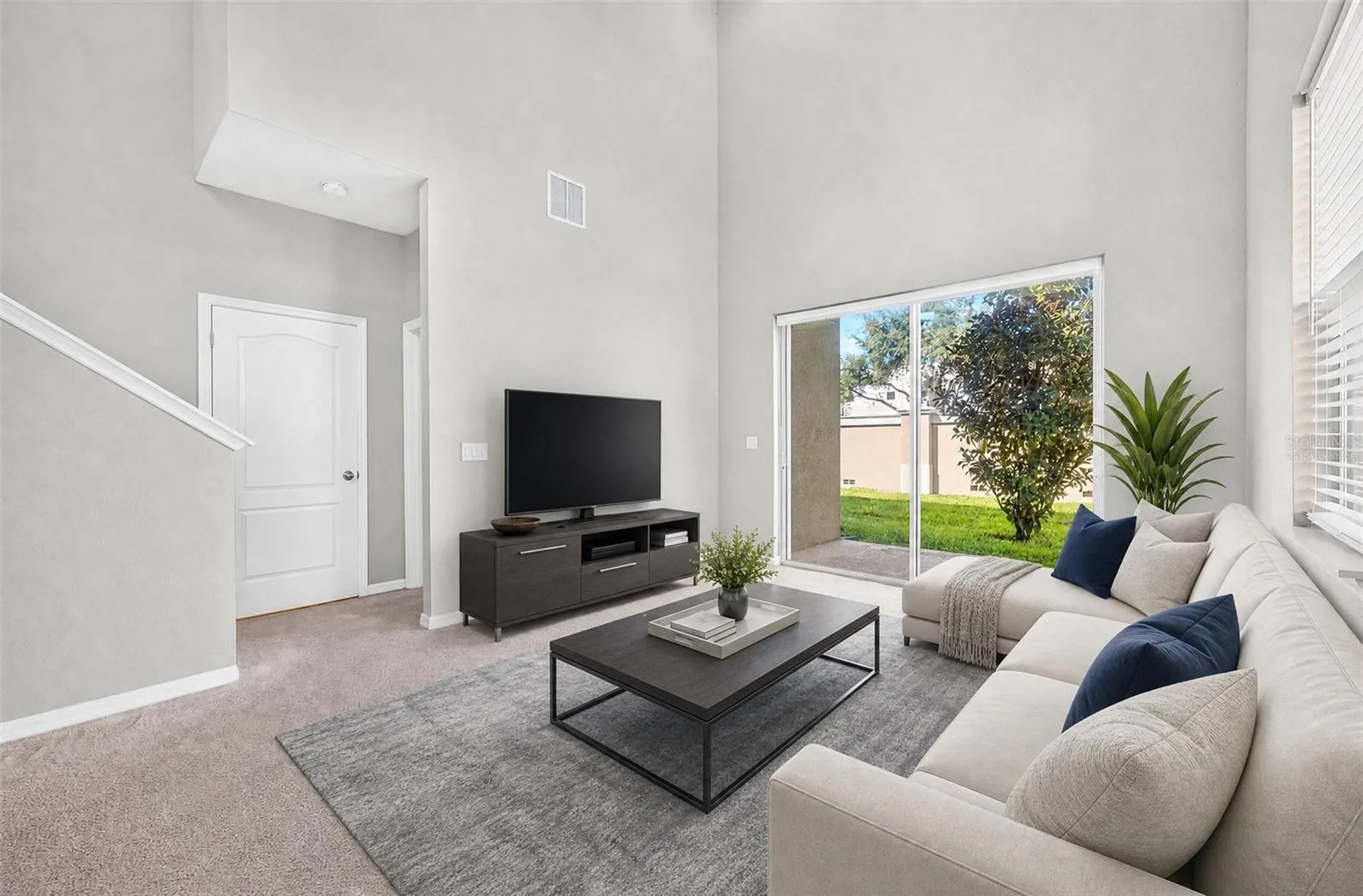 Bright and welcoming, the Living Room provides a comfortable gathering space with an open, airy feel. Virtually Staged