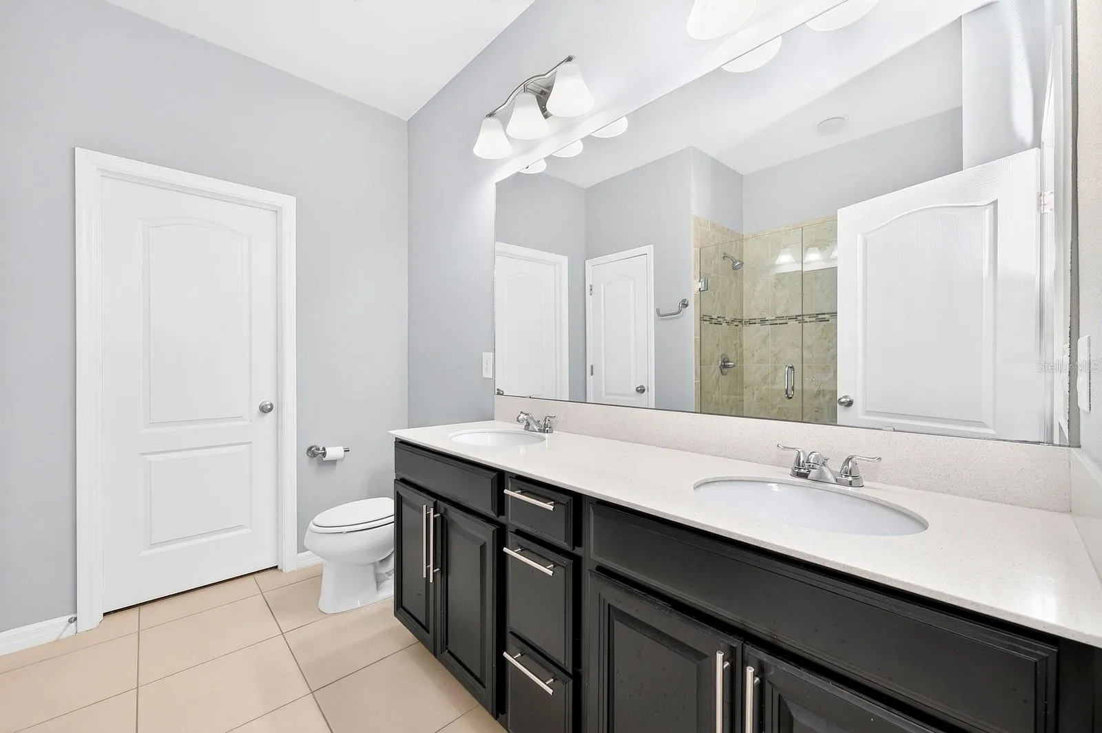 The Primary en suite Bath features a walk-in closet.