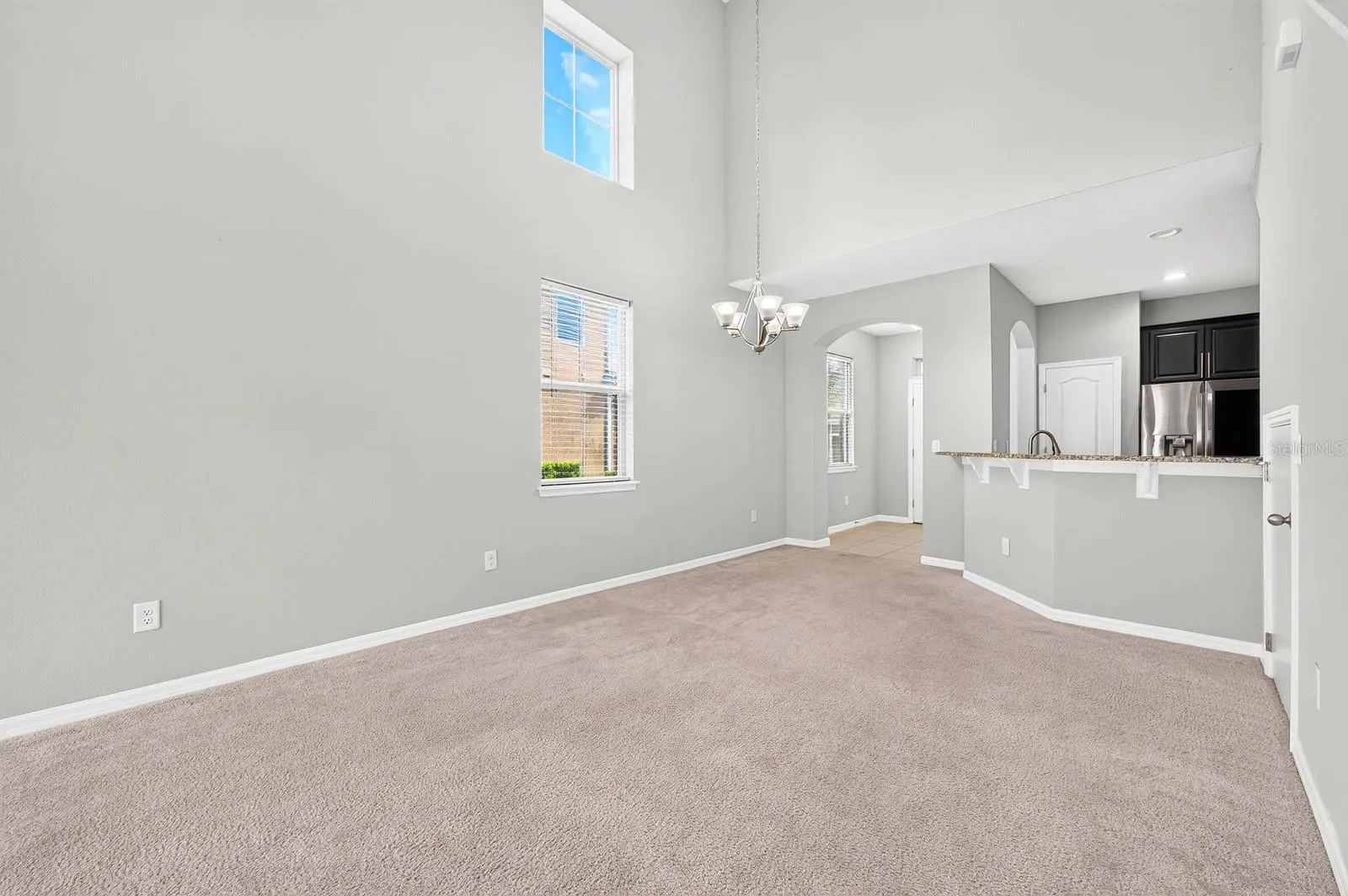 Step inside and you'll appreciate the SOARING CEILING, abundant natural light and graceful architectural details throughout.