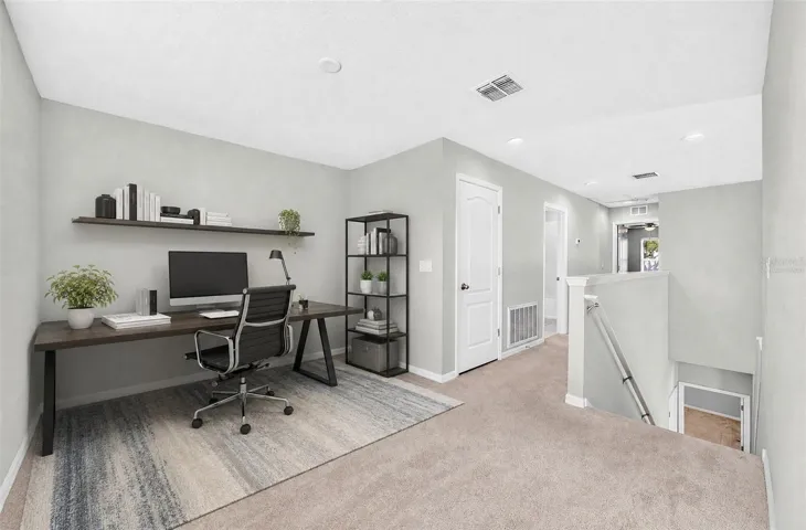 Upstairs, a VERSATILE LOFT provides additional living space that can easily accommodate a home office, reading area, media space or playroom. Virtually Staged