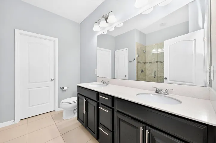 The Primary en suite Bath features a walk-in closet.