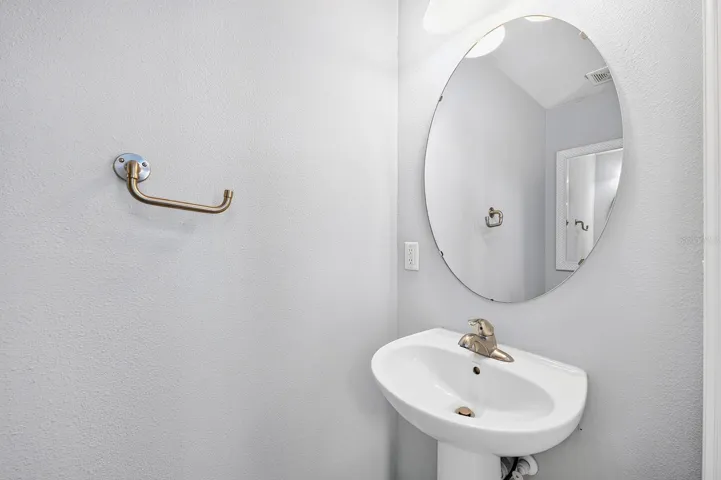A convenient Half Bath serves guests and family.