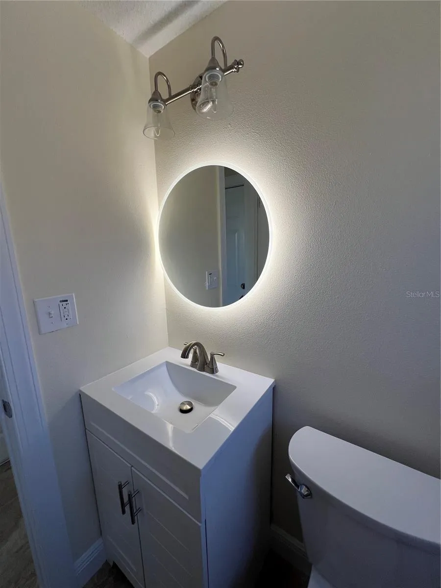TOUCH MIRROR TO LIGHT UP.