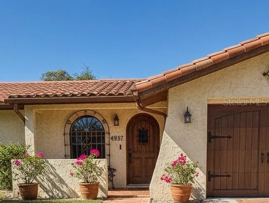 Virtually generated - Window change and front door garage color changed