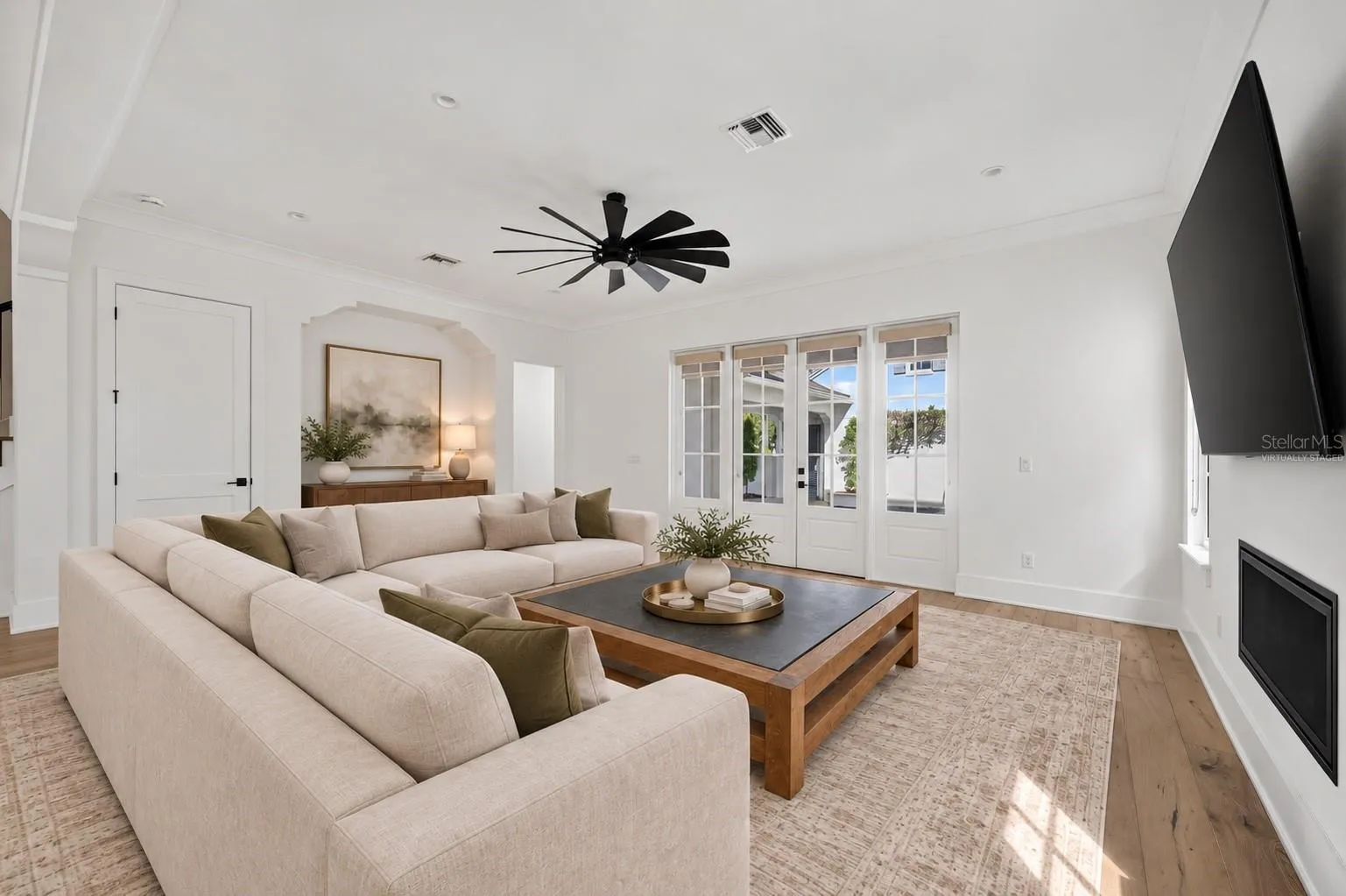Living room overlooking the courtyardVirtually Staged